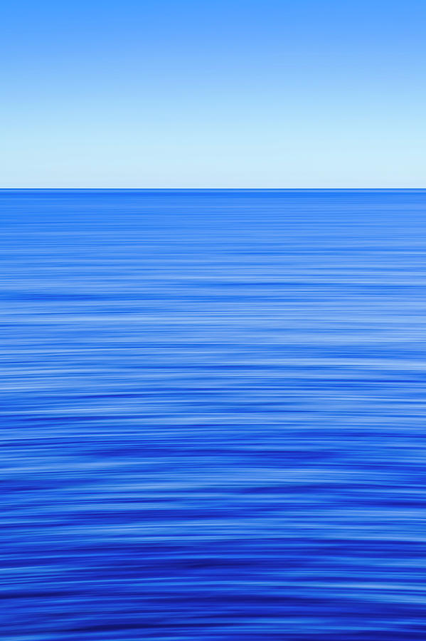 Silky Calm Sea, Blue Sky, Motion Blur Photograph by Kim Westerskov
