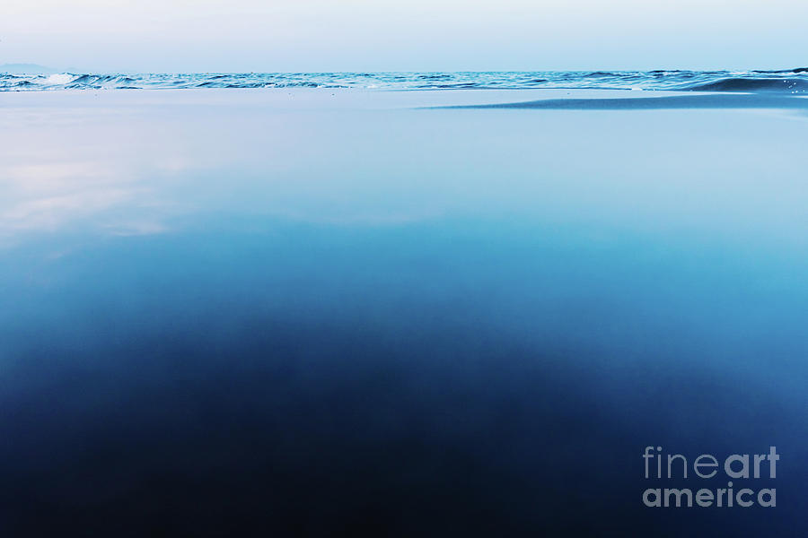 Silky calm water background with waves in the background and cal Photograph by Joaquin Corbalan