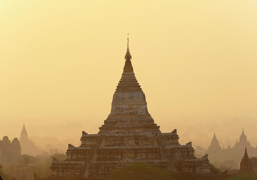 Sillhouette Of Pagodas Against Sunrise Photograph by Tarzan9280