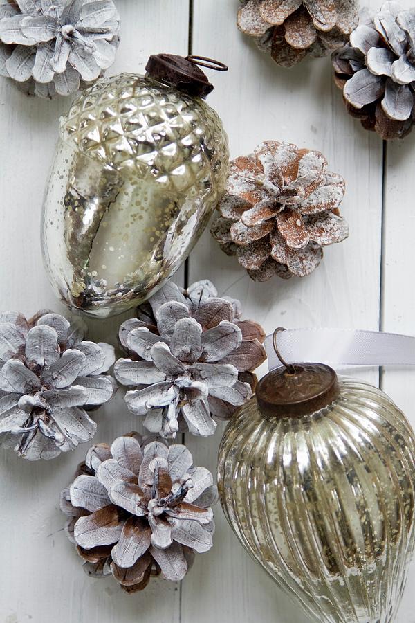 Silver Christmas Decorations And Pinecones Photograph by Catja Vedder