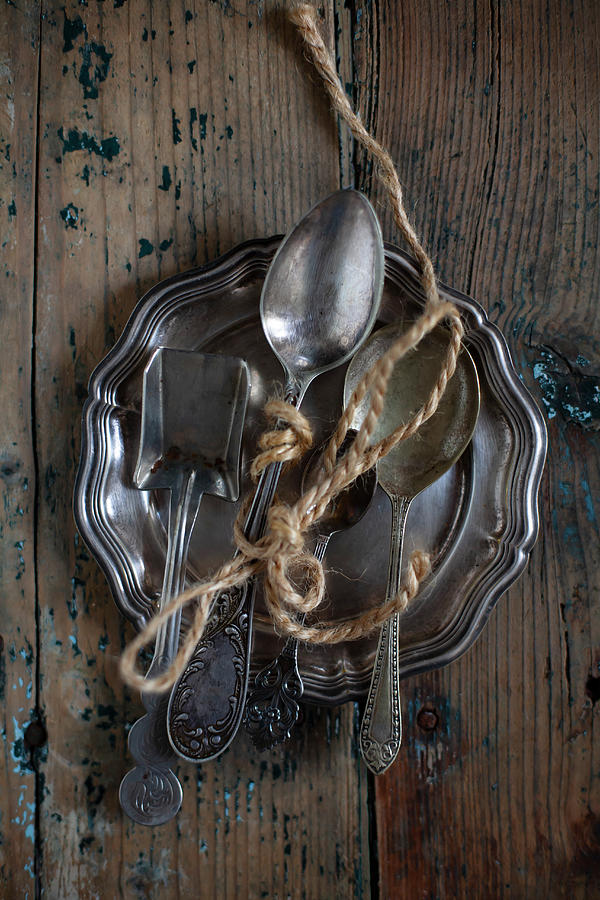 Silver Spoons Tied With Yarn On Tray Photograph by Alicja Koll