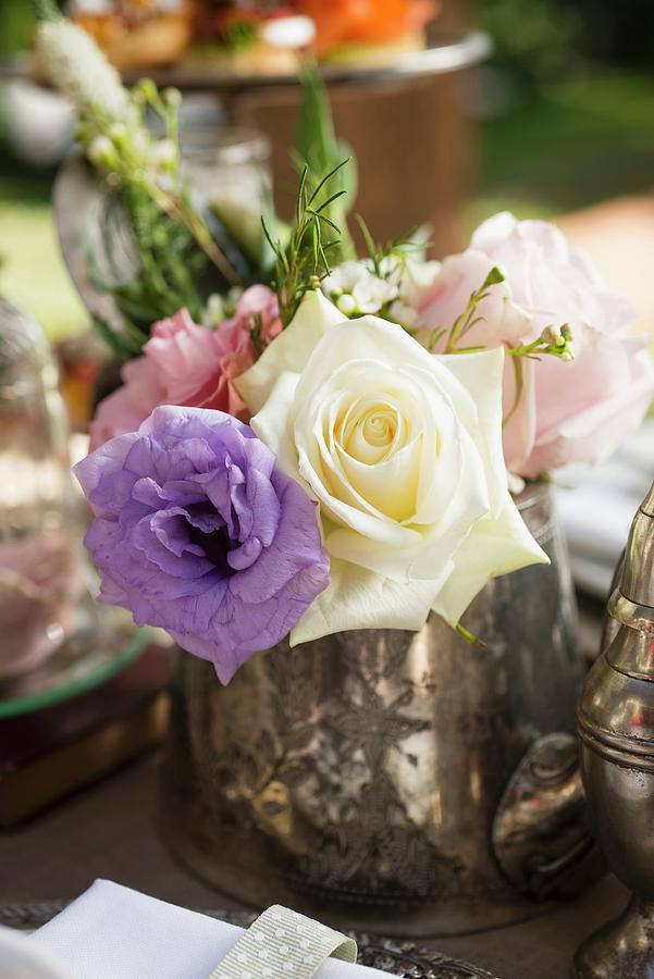 Silver Vase Of Roses On Tea-time Buffet Photograph by Great Stock!