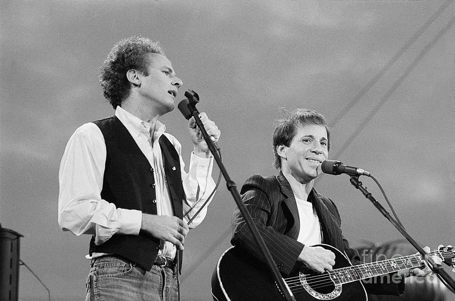 Simon And Garfunkel Performing On Stage Photograph by Bettmann