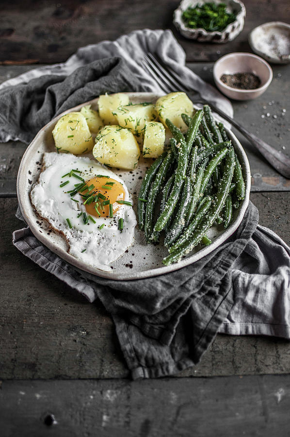 Simple Vegetarian Lunch With Fried Egg, Cooked Potatoes And Green Beans With Butter And Breadcrumbs Photograph by Kachel Katarzyna