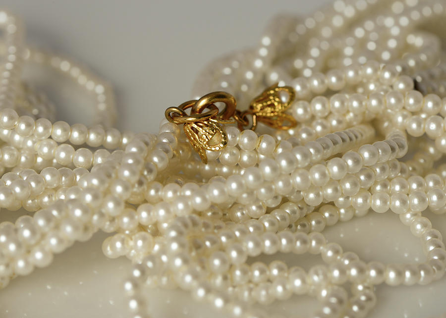 Simple vintage pearls with a gold clip Photograph by Cordia Murphy