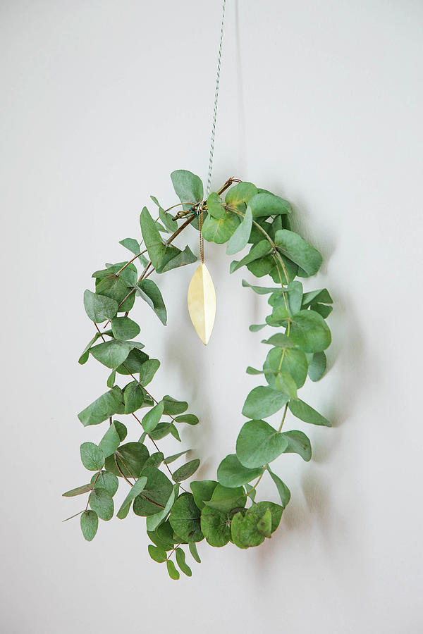 Simple Wreath Of Eucalyptus Branches Photograph by Ilaria Chiaratti