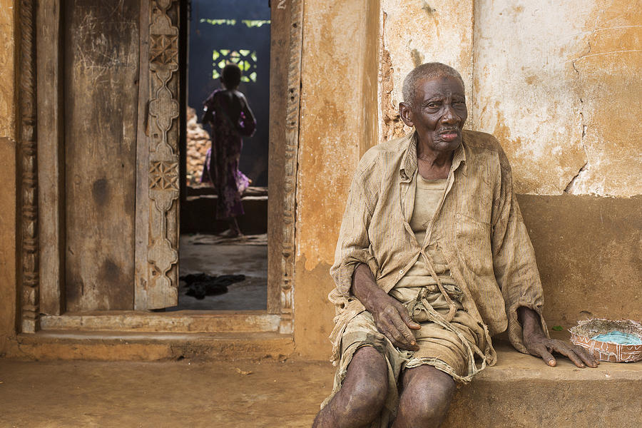 Portrait Photograph - Simplicity Of An Old Man. by Dan Mirica