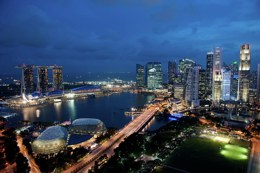 Singapore City Skyline At Dusk Photograph by Raisbeckfoto