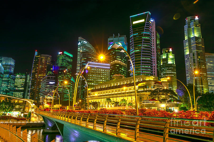 Singapore skyline night Photograph by Benny Marty