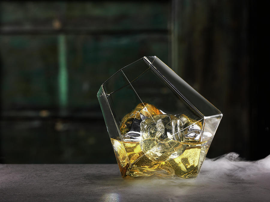 Single Malt Whisky In A Glass Photograph by Christian Schuster