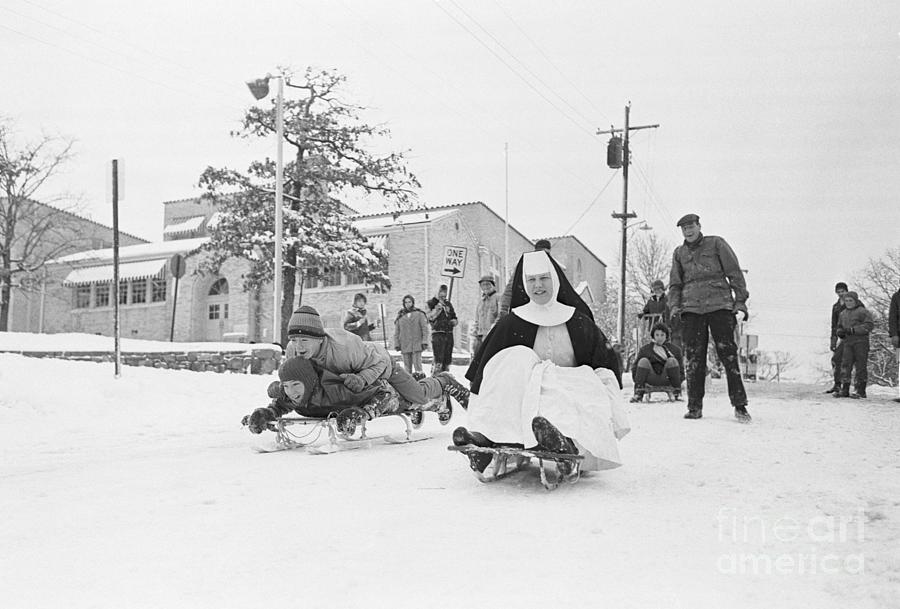 Sister Monica Rides A Sled With Children Photograph by Bettmann