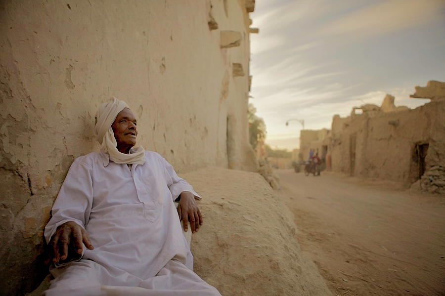 Siwan Man Sitting Outside House, Siwa Photograph by Cultura Rm Exclusive/romona Robbins Photography