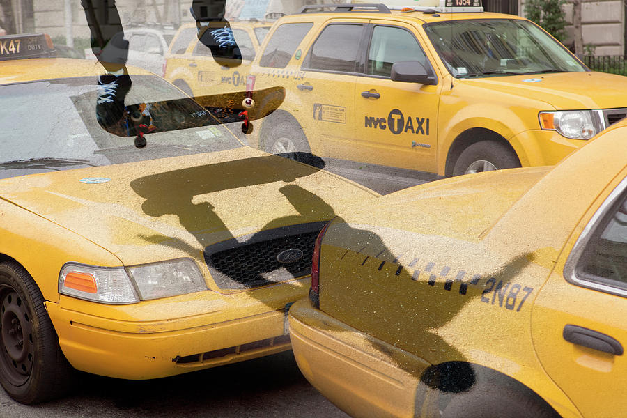 Skate Boarding Over New York Taxis Photograph by Nick Dolding