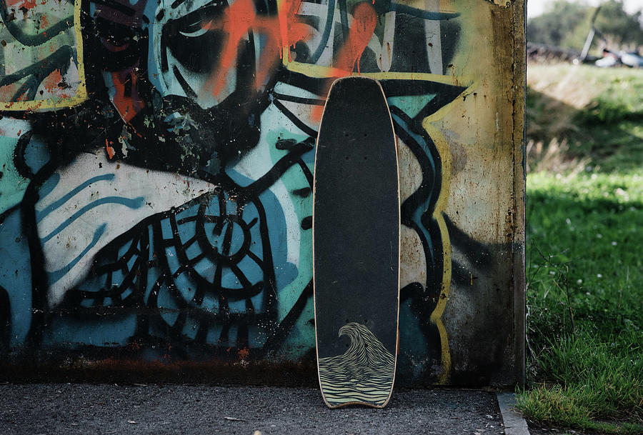 Skateboard Leaning Against A Wall At A Skatepark In The Uk Photograph ...