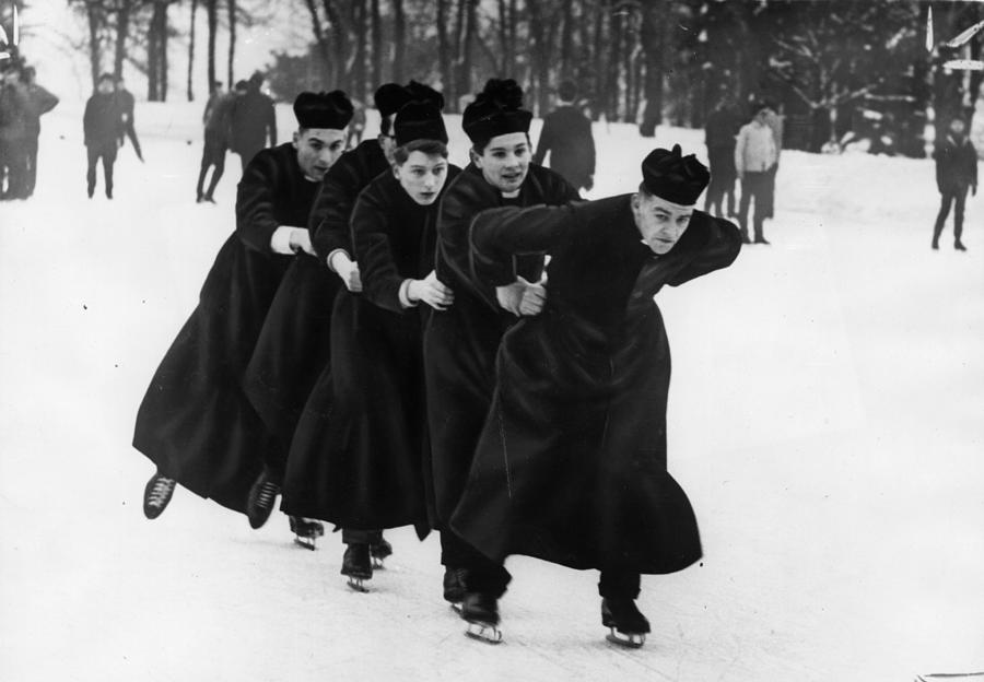 Skating Priests Photograph by Keystone