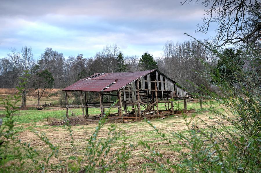 Skeleton Barn Under Darkening Sky by Douglas Barnett Skeleton Barn Under Darkening Sky by Douglas Barnett