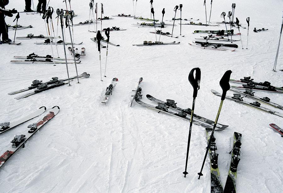 Ski Equipment On The Slopes At A Ski Photograph by Martin Diebel