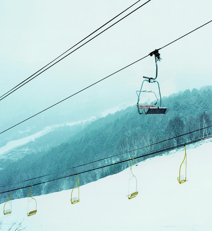 Ski Lifts On Snowy Mountain Photograph by Silvia Otte