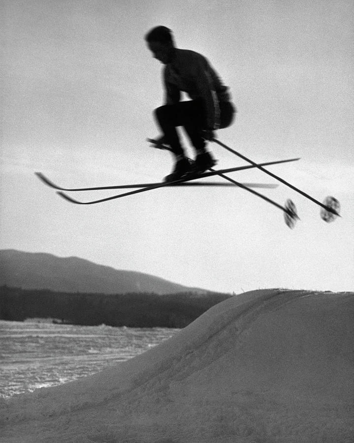 Skier In Mid Air Photograph by George Marks