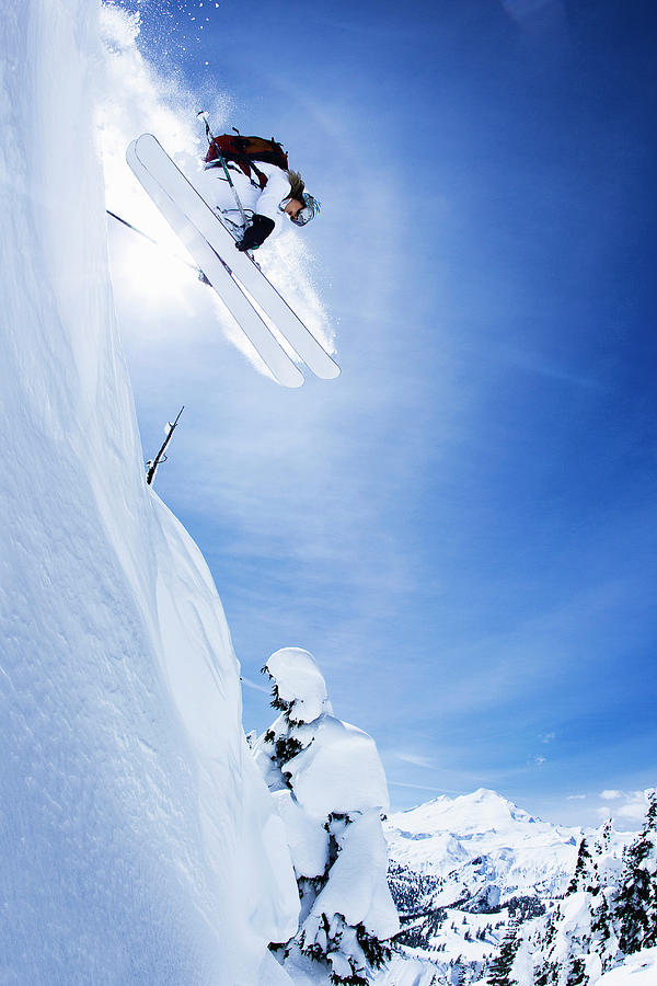 Skier Jumping On Snowy Slope Photograph by Jakob Helbig Skier Jumping On Snowy Slope Photograph by Jakob Helbig