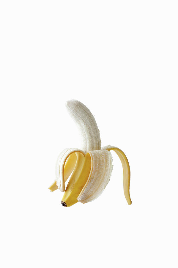 Skin Of Banana Peeled Off Half Photograph by Michael H