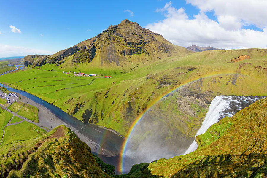 Skogafoss Waterfall in Iceland Photograph by Debra and Dave Vanderlaan