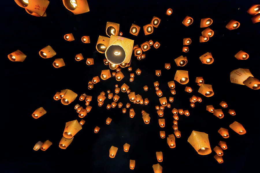 Sky Lanterns Launching Into The Sky Photograph by Jung-pang Wu