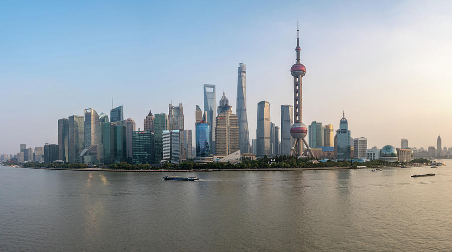 Skyline of the city of Shanghai at sunset Photograph by Steven Heap