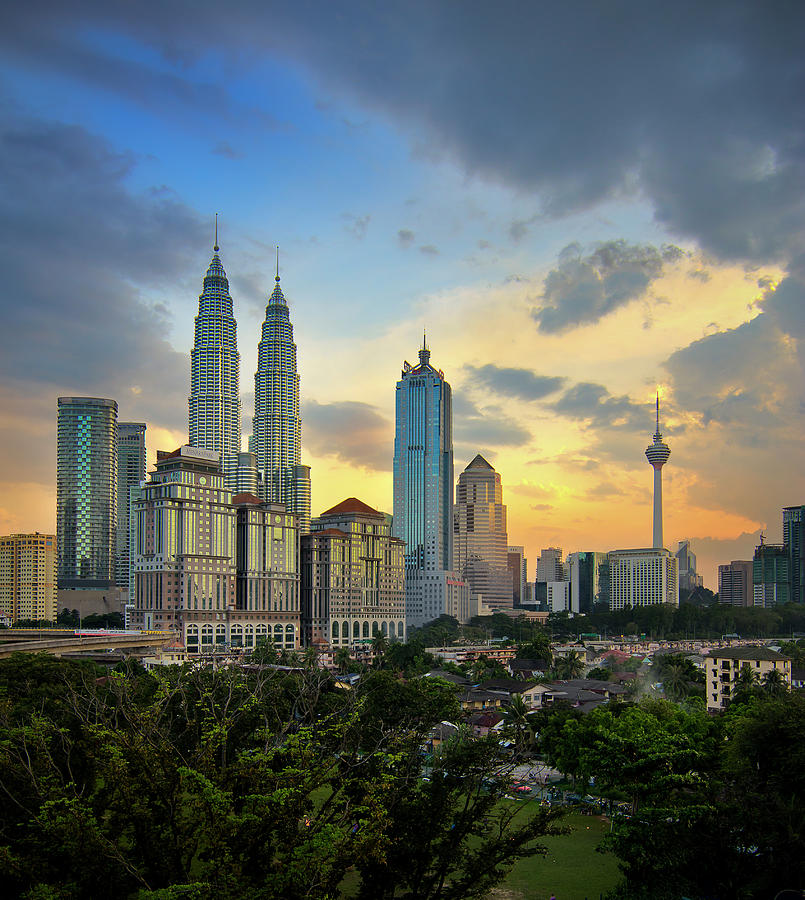 Skyscrapers At Sunset In Kuala Lumpur Photograph by Aaronlam