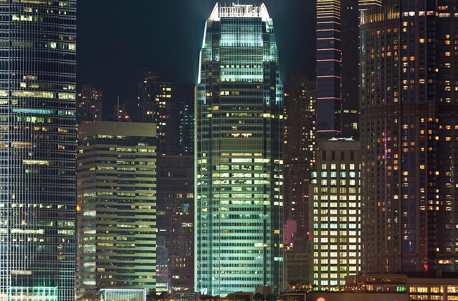 Skyscrapers Illuminated Crowded Photograph by Fotovoyager
