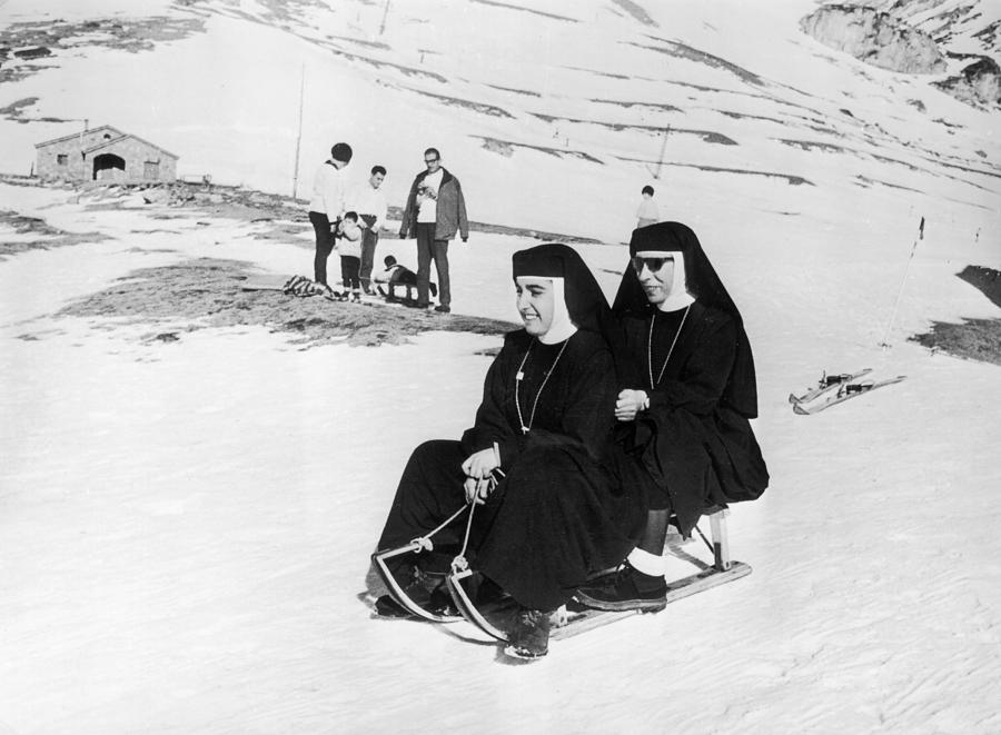 Sledging Nuns Photograph by Central Press