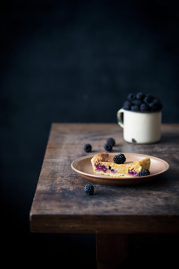 Slice Of A Blackberry Almond Tart Photograph by Malgorzata Laniak