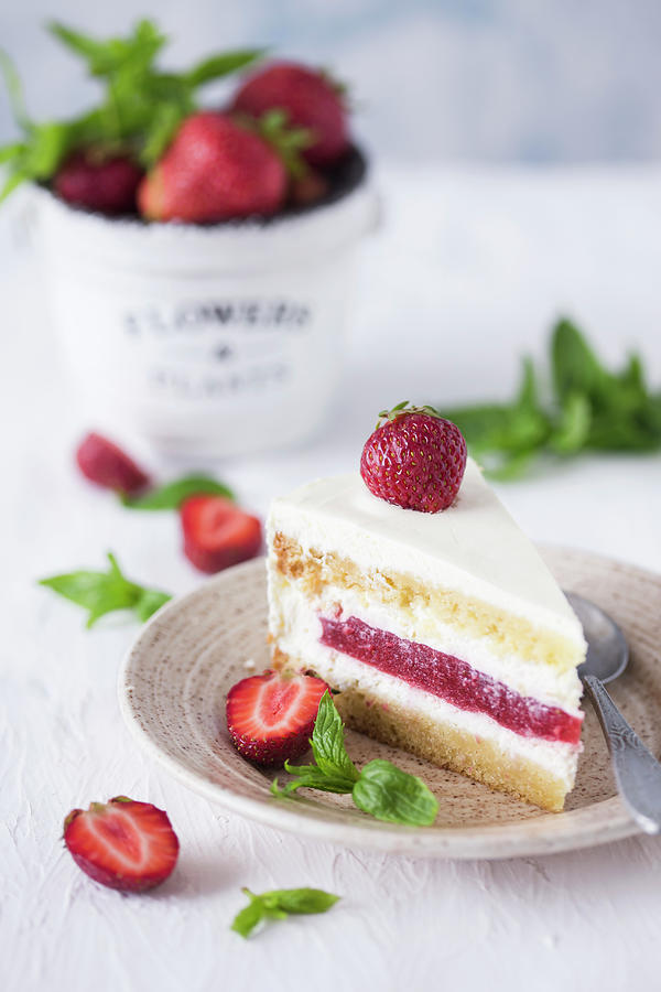 Slice Of A Vanilla And Strawberry Cake Photograph by Malgorzata Laniak