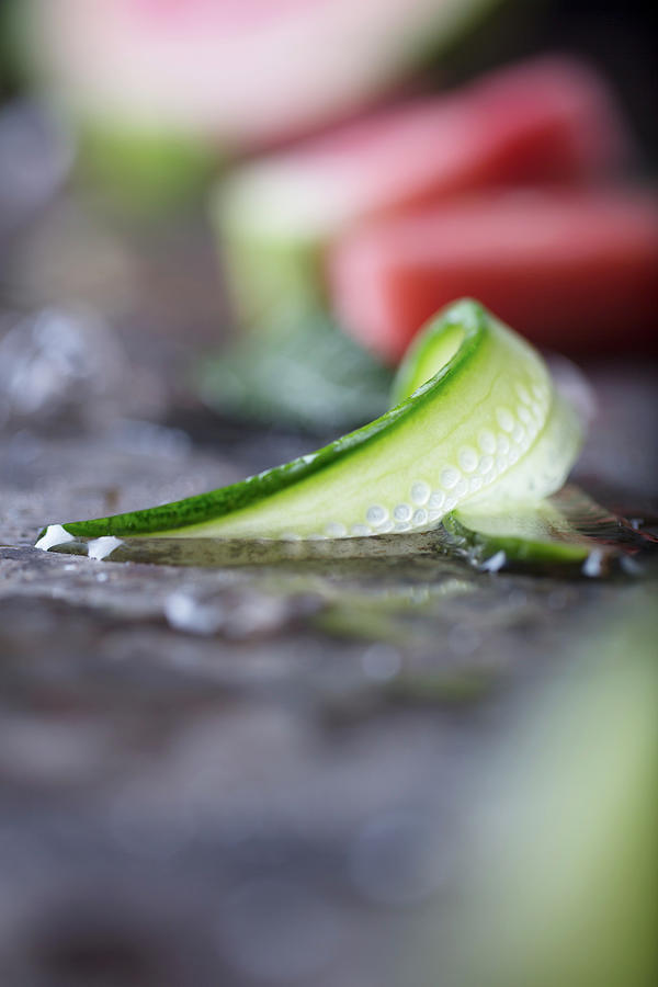 Slice Of Curled Cucumber Photograph by Amelia Johnson