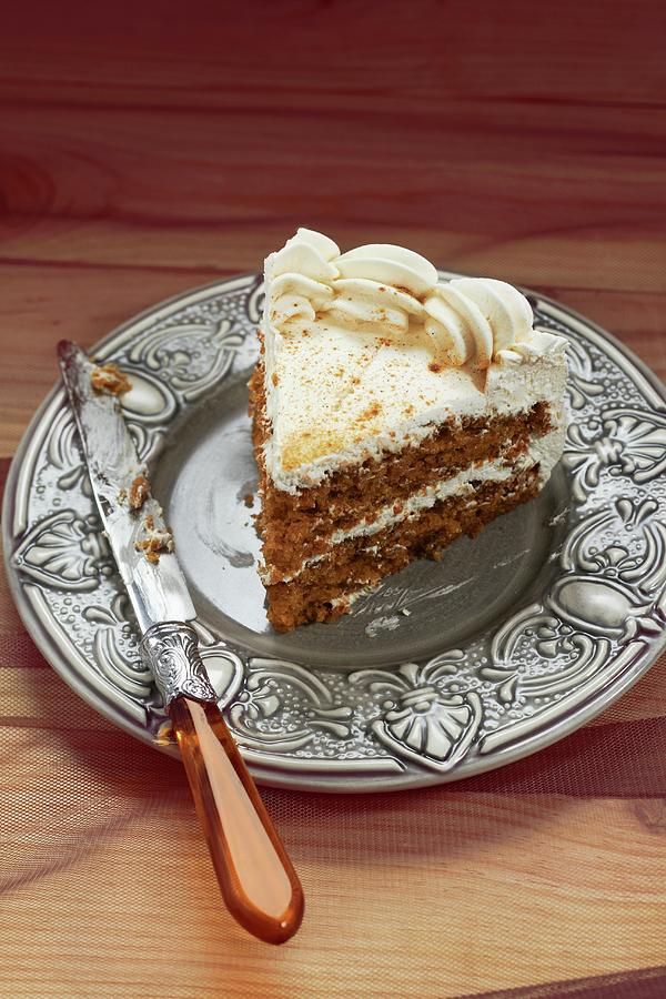 Slice Of Double Layer Carrot Cake With Cream Cheese Frosting Photograph by Miriam Rapado