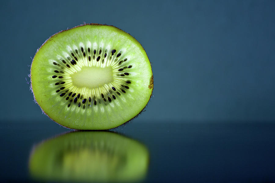 Slice Of Kiwi Fruit Photograph by By Felix Schmidt