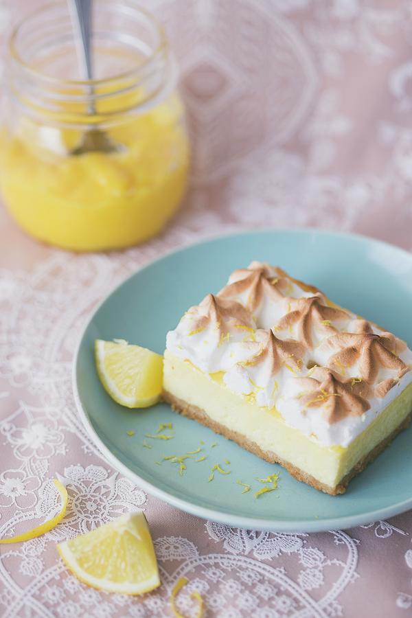 Slice Of Lemon Cheesecake With Meringue Photograph by Malgorzata Laniak