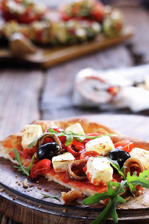 Slice Of Pizza With Olives, Feta And Anchovies Photograph by Weymann, Frank