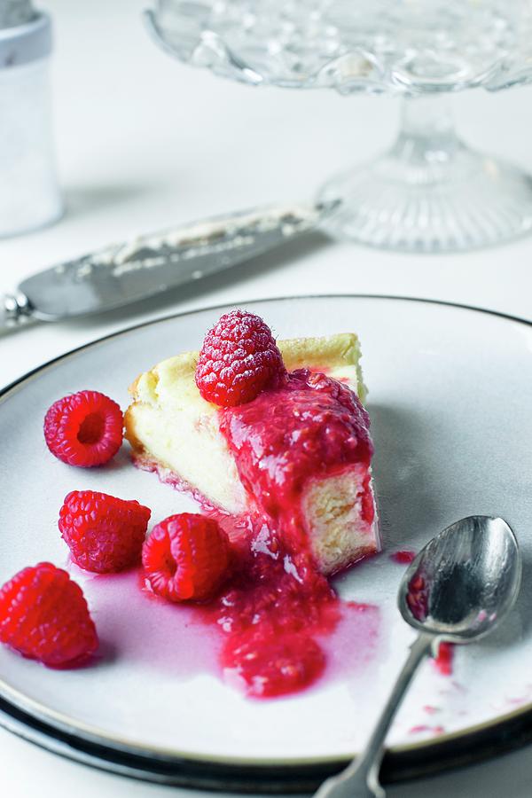 Slice Of Rasberry Cheesecake With Fresh Raspberries Photograph by Magdalena Hendey