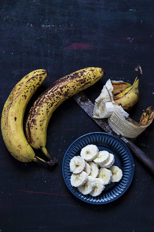 Sliced Banana And Overripe Bananas Photograph by Adel Bekefi
