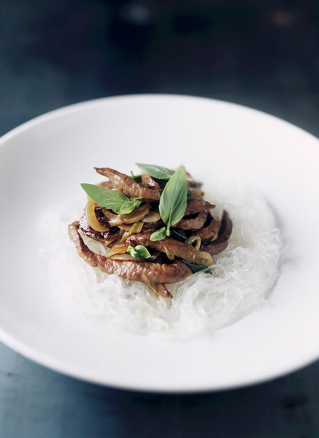 Sliced Beef With Thai Basil On A Bed Of Rice Vermicelli Photograph by Mallet