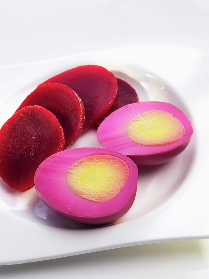 Sliced Beets And A Hard Boiled Egg Boiled In Beet Juice Photograph by
