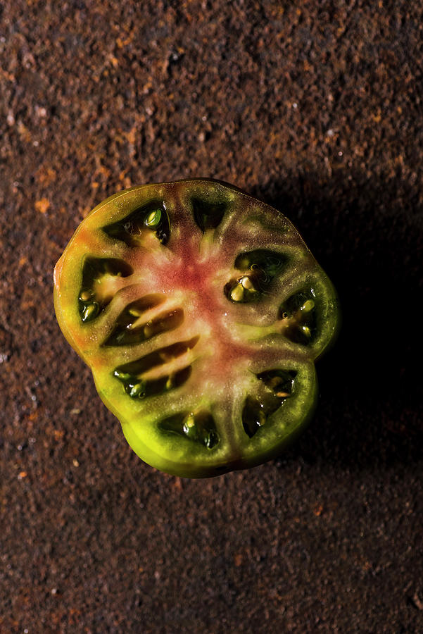 Sliced Kumato Tomato Photograph by Mateusz Siuta