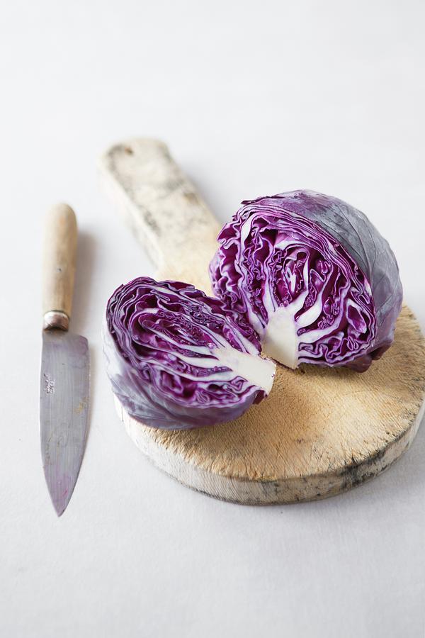 Sliced Purple Cabbage On A Chopping Board Photograph by Rocio Stella Graves Garcia-gutierrez