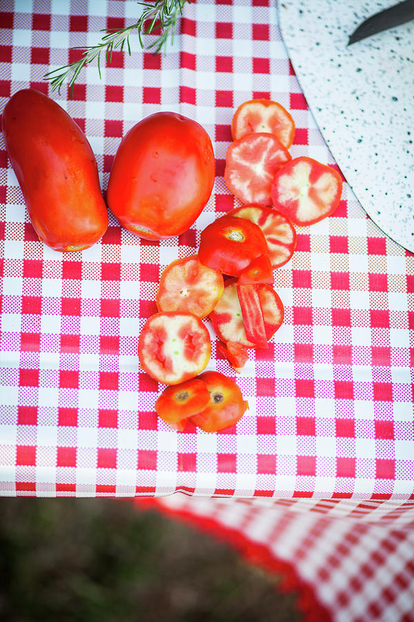 Sliced Tomatoes On A Camping Table Photograph by Eising Studio