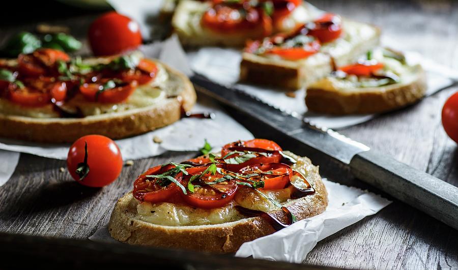 Slices Of Bread Topped With Cherry Tomatoes, Mozzarella And Balsamic Vinegar Photograph by Mateusz Siuta