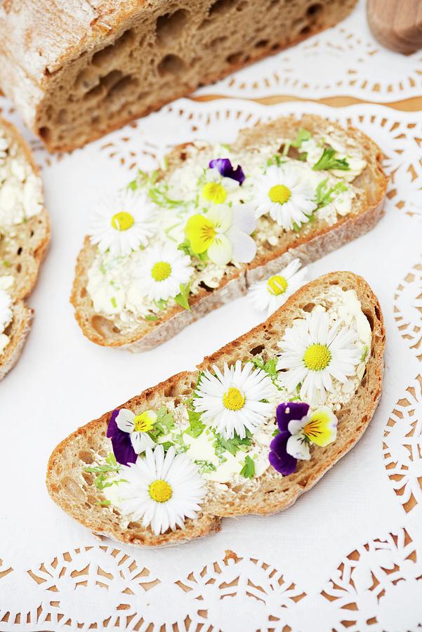 Slices Of Bread Topped With Daisies And Tufted Pansies Photograph by Ewa Rejmer