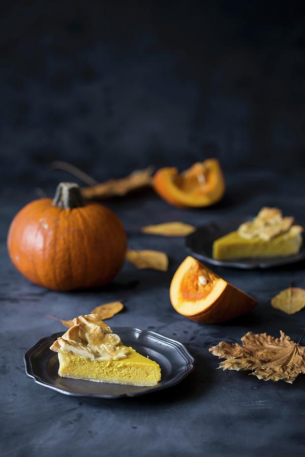 Slices Of Pumpkin Pie Decorated With Pastry Leaves On Plates Photograph by Malgorzata Laniak