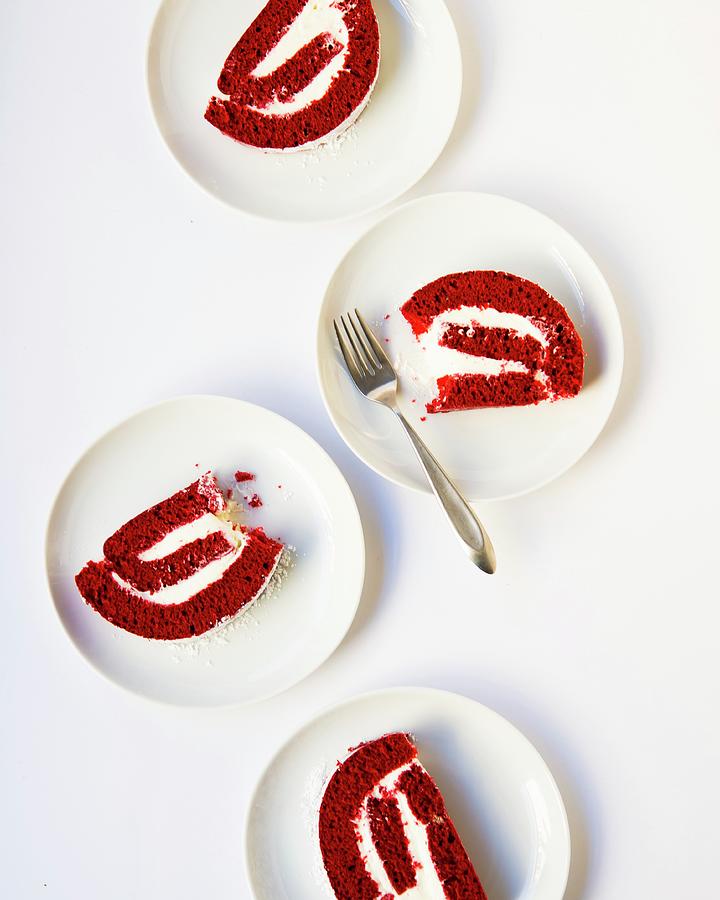 Slices Of Red Velvet Sponge Cake On Dessert Plates Photograph by Lisa Rees