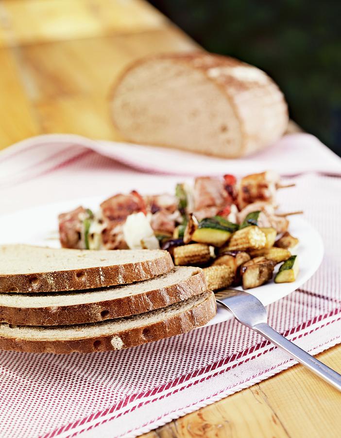 Slices Of Rye Bread With Vegetable Salad And Grilled Skewers Photograph by Till Melchior